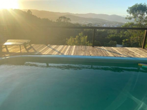 Casa com vista para o mar e vale